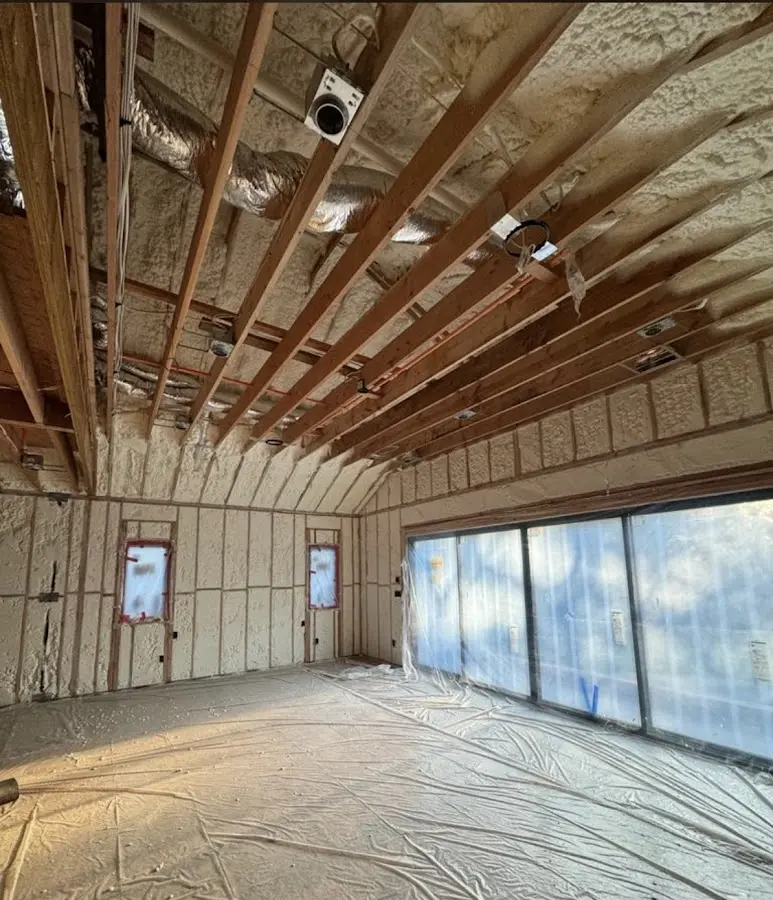 Interior walls and ceiling insulated with spray foam during new construction in Heber